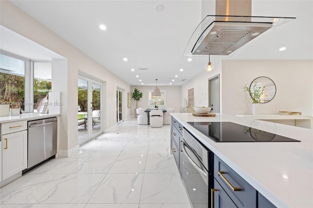 kitchen featuring french doors, light stone counters, hanging light fixtures, stainless steel appliances, and white cabinets