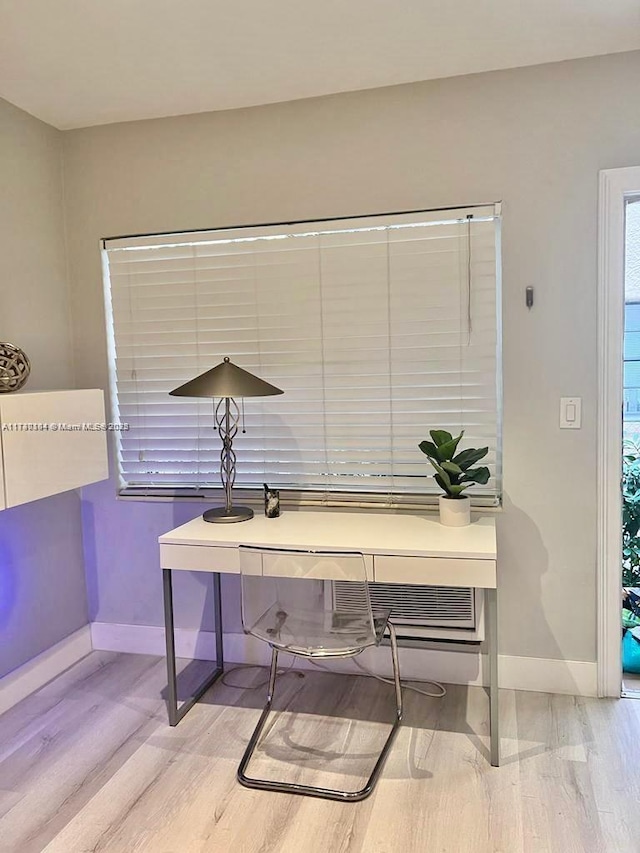 1551 Michigan Ave Unit 6, Miami Beach, FL 33139 - office area featuring baseboards and light wood-style flooring