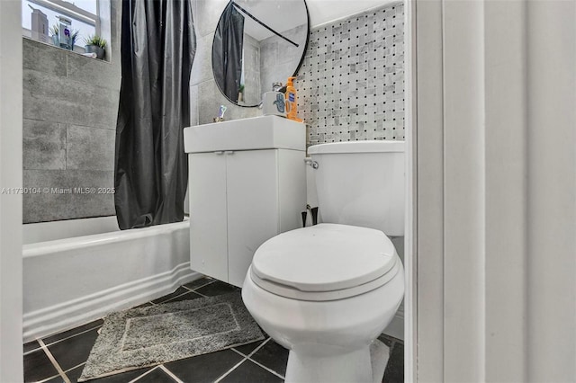1551 Michigan Ave Unit 6, Miami Beach, FL 33139 - full bathroom with tile patterned floors, vanity, toilet, and shower / tub combo with curtain