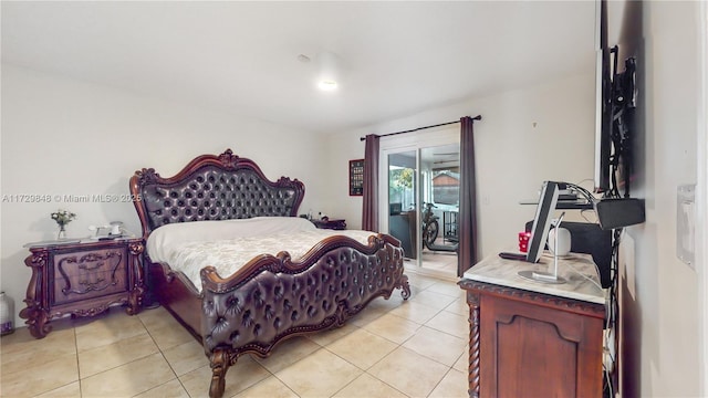 bedroom with light tile patterned floors