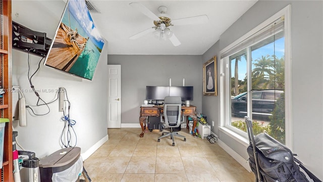 office with ceiling fan and light tile patterned floors