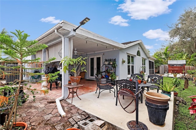 view of patio / terrace featuring french doors and ceiling fan