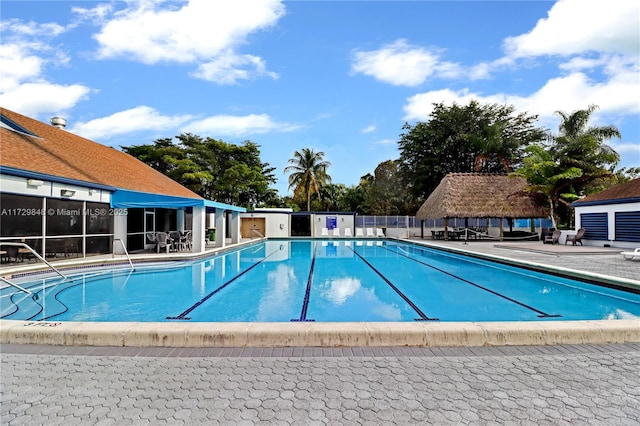 view of swimming pool featuring a patio area