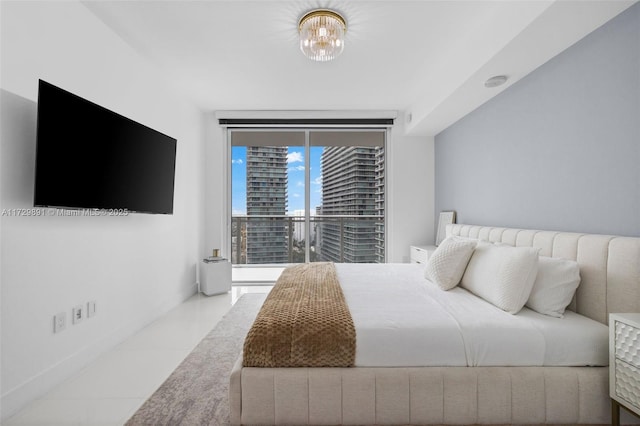 bedroom with light tile patterned floors and floor to ceiling windows