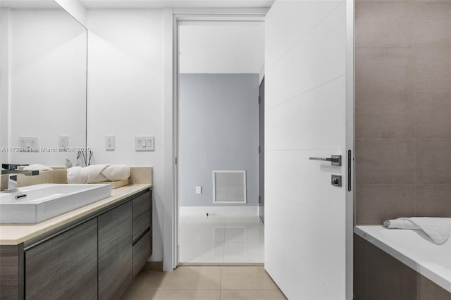 bathroom featuring vanity and tile patterned flooring