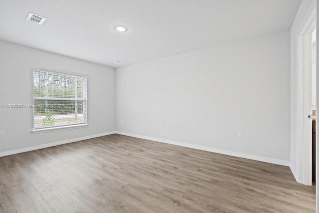 empty room featuring light hardwood / wood-style flooring