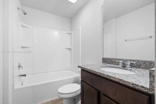 full bathroom with shower / bathtub combination, toilet, and vanity