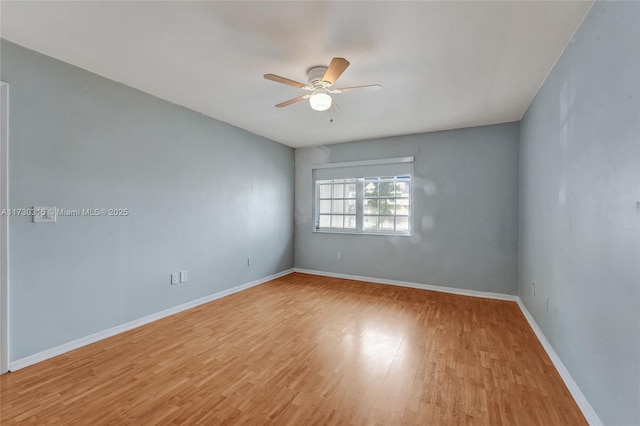 unfurnished room with light wood-type flooring and ceiling fan