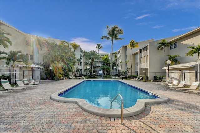 view of swimming pool with a patio area