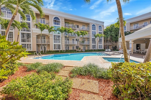 community pool with a patio