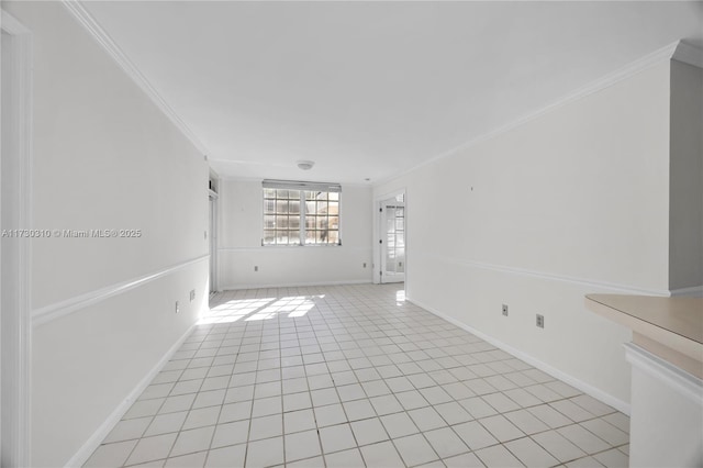 unfurnished living room with light tile patterned flooring, crown molding, and baseboards