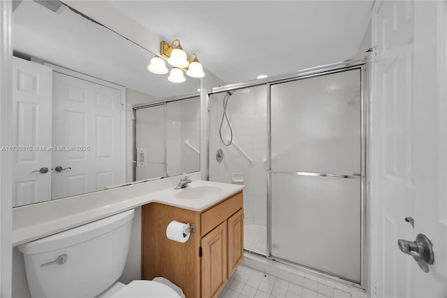 full bath featuring visible vents, toilet, vanity, a shower stall, and tile patterned flooring