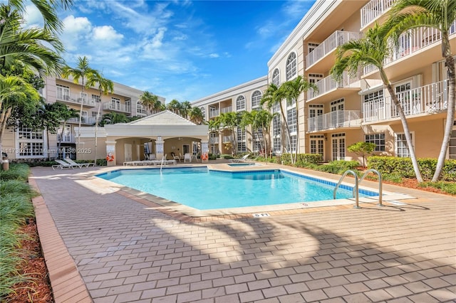 pool with a community hot tub