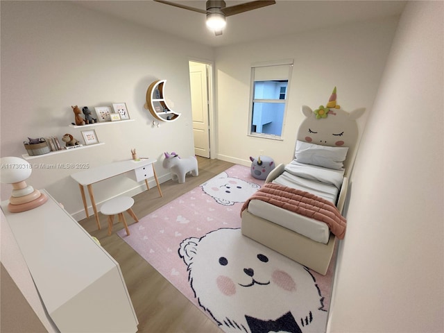 living room with light wood-type flooring and ceiling fan