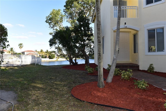 view of yard with a water view