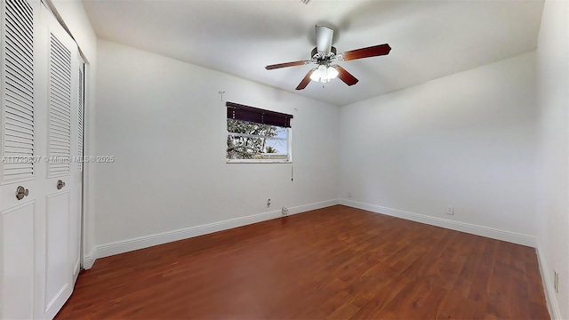 unfurnished bedroom featuring ceiling fan, hardwood / wood-style flooring, and a closet