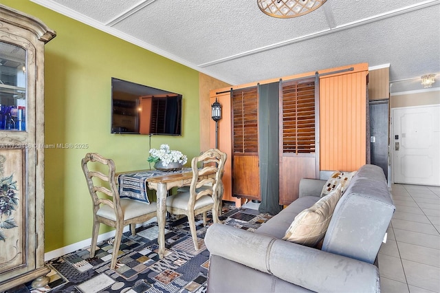 living room with a textured ceiling, ornamental molding, and tile patterned flooring