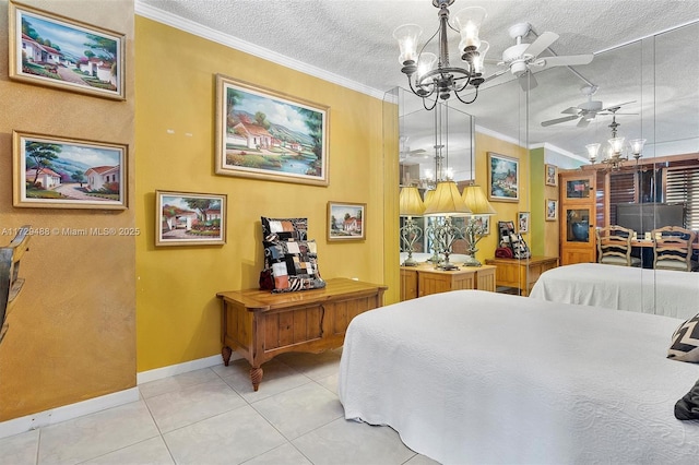 tiled bedroom featuring ornamental molding, an inviting chandelier, and a textured ceiling