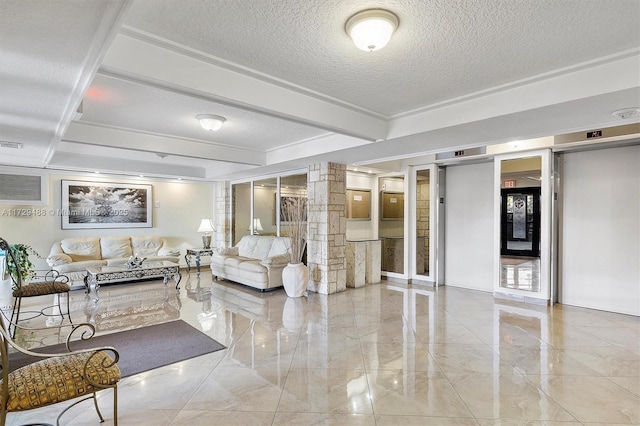 living room with elevator, a textured ceiling, and beam ceiling