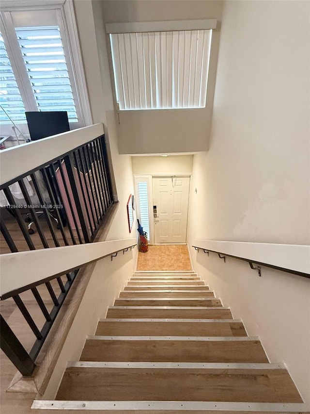 stairway with a high ceiling