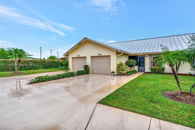 ranch-style house with a garage and a front lawn