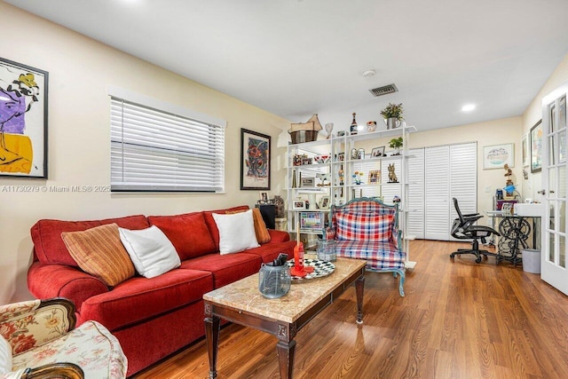 living room with wood-type flooring