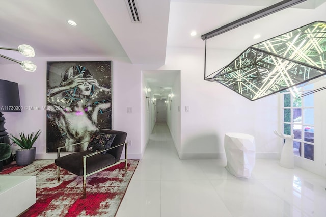 hallway with tile patterned flooring