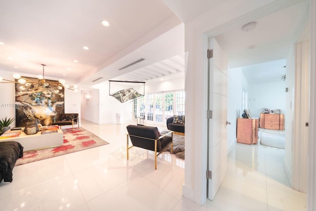 hall with light tile patterned floors