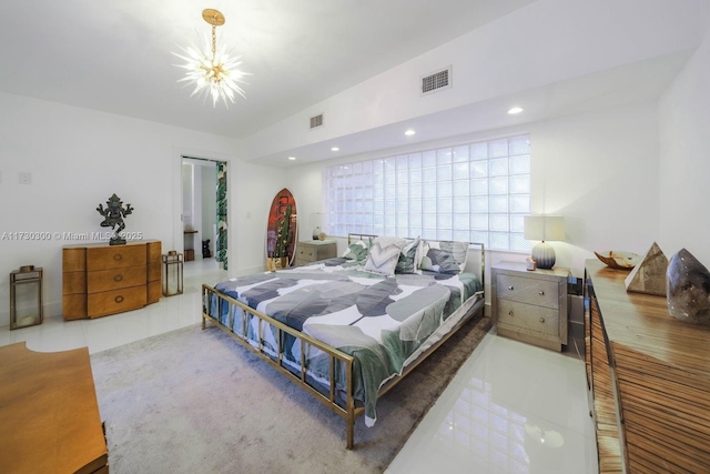 bedroom with a notable chandelier