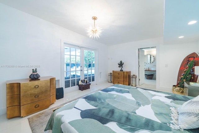 bedroom with access to exterior, a chandelier, and french doors