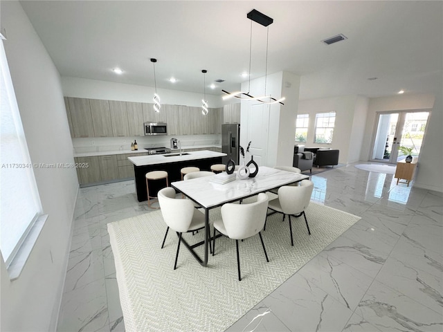 dining area featuring french doors