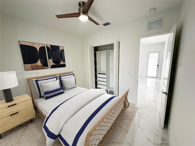 bedroom with a closet and ceiling fan