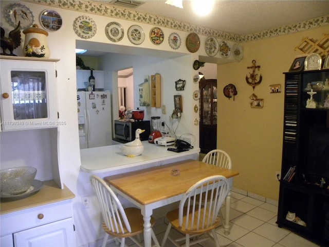 view of tiled dining room