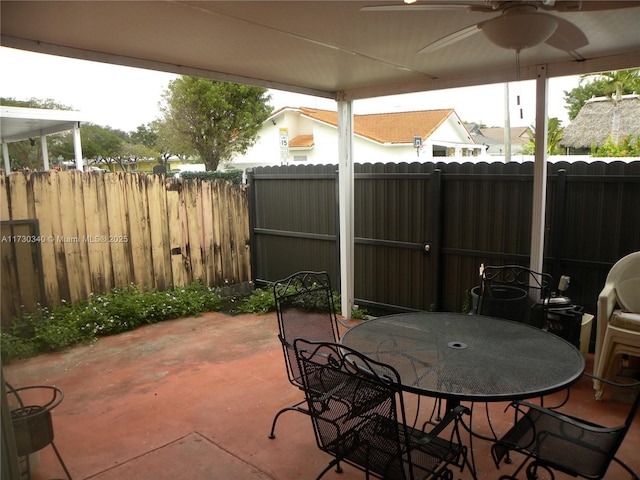 view of patio / terrace featuring ceiling fan