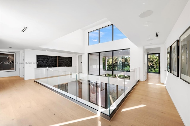 hall with light wood-type flooring