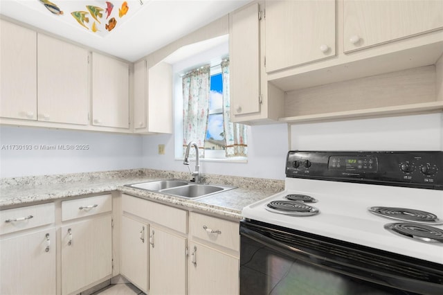 kitchen featuring sink and electric range oven