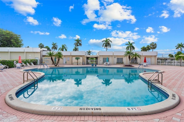 view of pool featuring a patio area