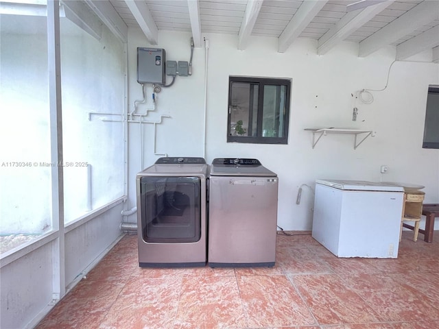 washroom featuring washer and dryer