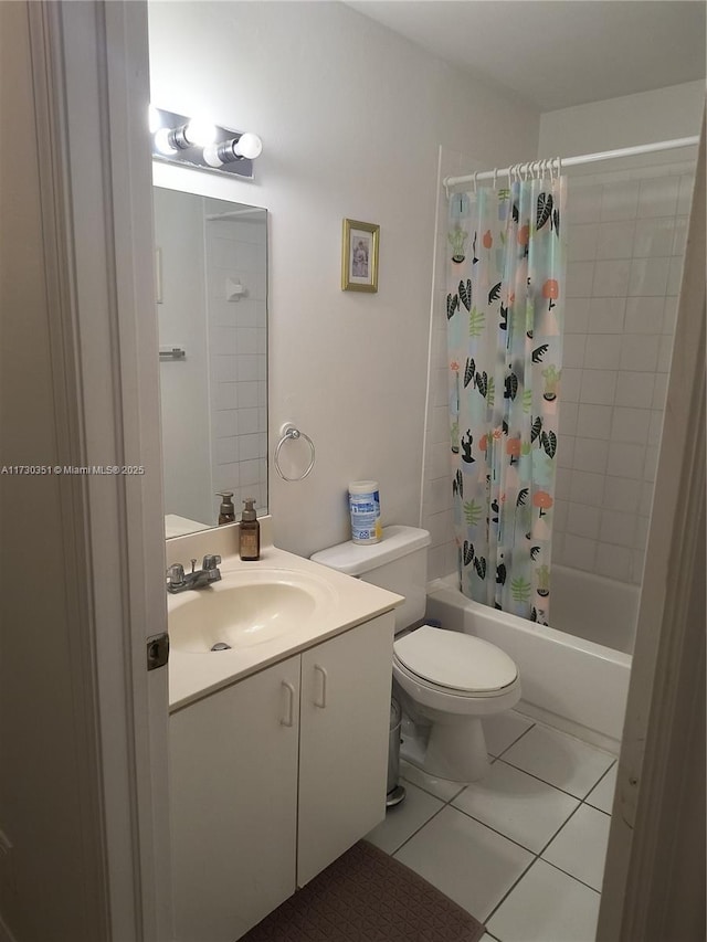 full bathroom with tile patterned flooring, vanity, shower / tub combo, and toilet