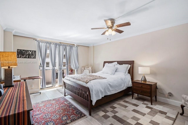 bedroom with crown molding, ceiling fan, access to exterior, and light hardwood / wood-style flooring