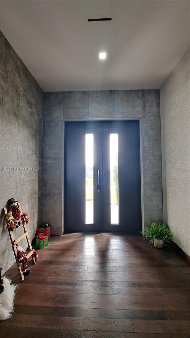 entrance foyer featuring wood-type flooring and french doors