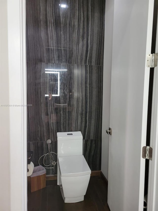 bathroom featuring toilet