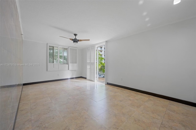 unfurnished room featuring a healthy amount of sunlight and ceiling fan