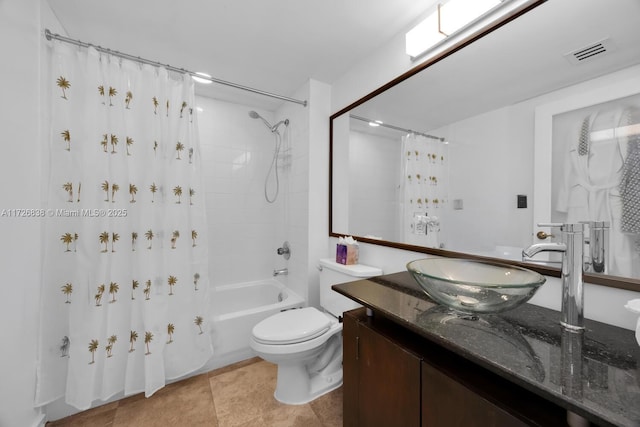 full bathroom featuring vanity, toilet, tile patterned floors, and shower / bath combo