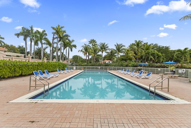 view of swimming pool featuring a patio