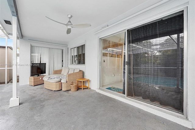 view of patio featuring ceiling fan