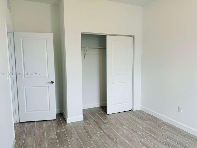 unfurnished bedroom featuring a closet