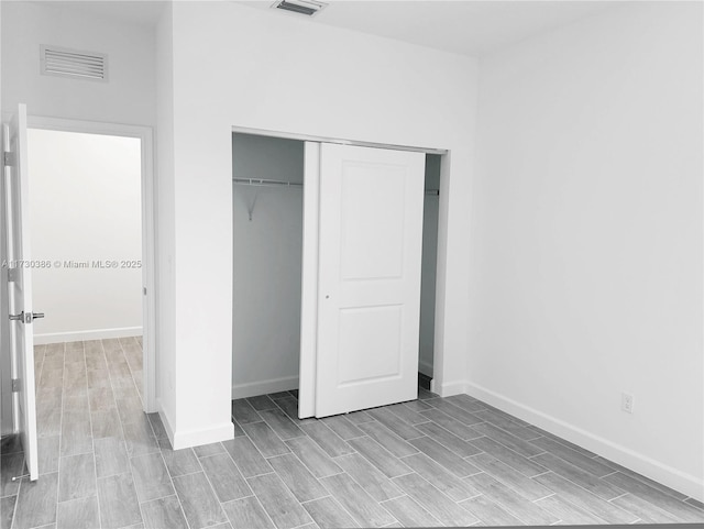 unfurnished bedroom featuring a closet