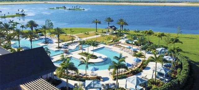 birds eye view of property featuring a water view