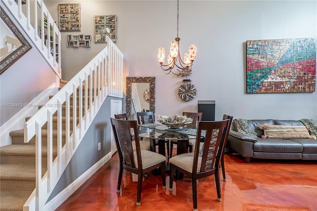 dining area featuring an inviting chandelier